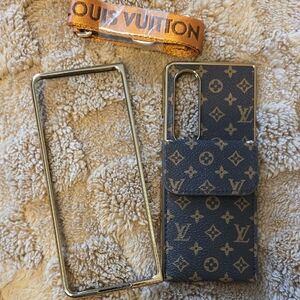 Samsung Glaxy Z Fold 4 Monogram Black and Gold Phone Case with Orange Strap